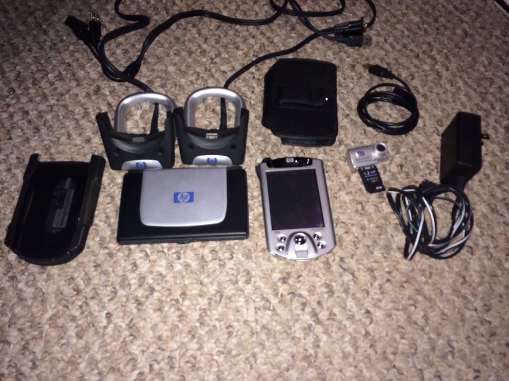 Accessories for aforementioned iPaq. Included docking cradle, expanded battery and a keyboard.